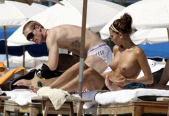 4. Oksana Andersson – Topless sunbathing, 2008