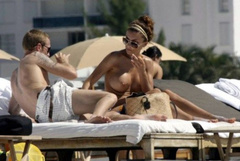 6. Oksana Andersson – Topless sunbathing, 2008
