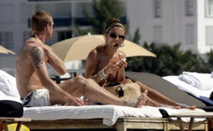 10. Oksana Andersson – Topless sunbathing, 2008