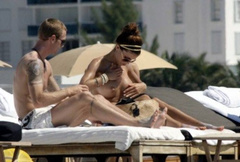 11. Oksana Andersson – Topless sunbathing, 2008