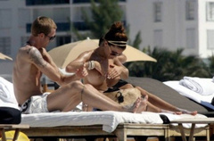 12. Oksana Andersson – Topless sunbathing, 2008