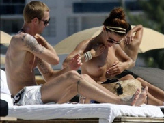 16. Oksana Andersson – Topless sunbathing, 2008