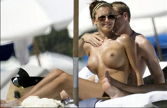 18. Oksana Andersson – Topless sunbathing, 2008