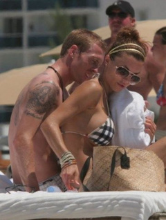 4. Oksana Andersson – Topless sunbathing, 2008