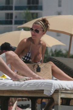 6. Oksana Andersson – Topless sunbathing, 2008