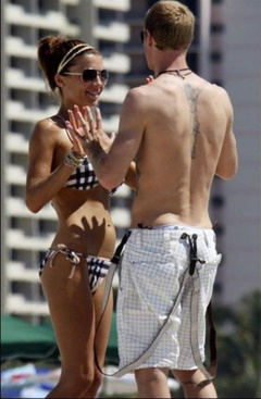 8. Oksana Andersson – Topless sunbathing, 2008