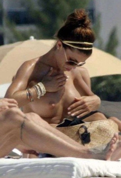 12. Oksana Andersson – Topless sunbathing, 2008