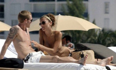 16. Oksana Andersson – Topless sunbathing, 2008