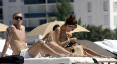 18. Oksana Andersson – Topless sunbathing, 2008