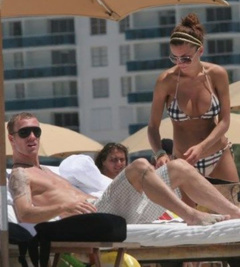 6. Oksana Andersson – Topless sunbathing, 2008