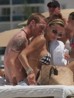 9. Oksana Andersson – Topless sunbathing, 2008