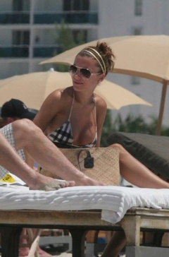 11. Oksana Andersson – Topless sunbathing, 2008