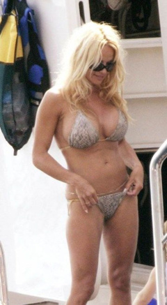 8. Pamela Anderson – Topless sunbathing, 2006