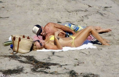 7. Pamela Anderson – yellow bikini, 2009