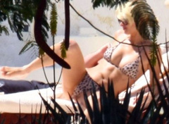 4. Paris Hilton – Topless sunbathing, 2010
