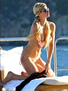 6. Paris Hilton – Topless sunbathing, 2010