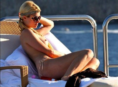 10. Paris Hilton – Topless sunbathing, 2010
