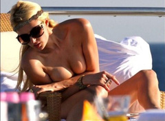 11. Paris Hilton – Topless sunbathing, 2010