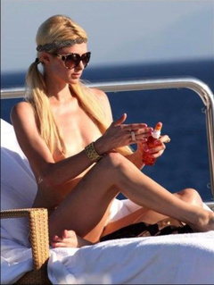 12. Paris Hilton – Topless sunbathing, 2010