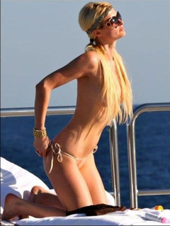 15. Paris Hilton – Topless sunbathing, 2010