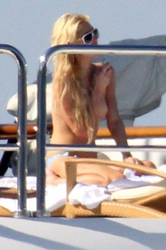 6. Paris Hilton – Topless sunbathing, 2010