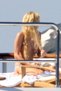 7. Paris Hilton – Topless sunbathing, 2010