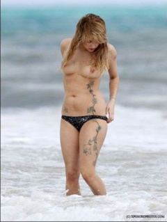 5. Peaches Geldof – topless at the beach, 2009