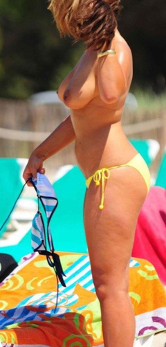 2. Rachael White – Topless sunbathing, 2011