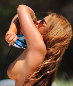 7. Rachael White – Topless sunbathing, 2011