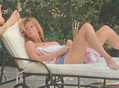 3. Rachel Hunter – Topless sunbathing, 2003
