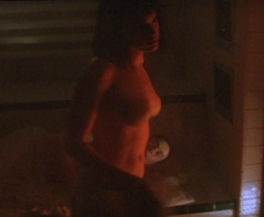 6. Rebecca Romijn Naked – Rollerball, 2002