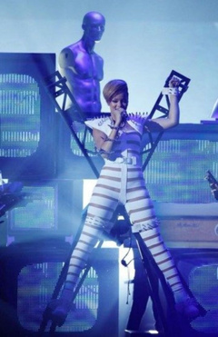5. Rihanna – Stripes suit in Concert, 2009