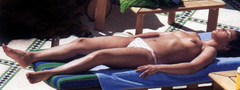 2. Severine Ferrer – topless sunbathing, 1999