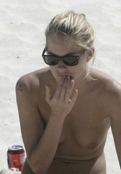 6. Sienna Miller – Topless sunbathing, 2007