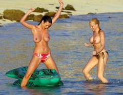 11. Sophie Howard – topless at the beach, 2011