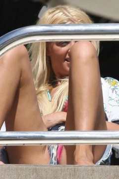 7. Tara Reid – purple bikini, 2009