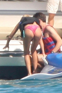 12. Tara Reid – purple bikini, 2009