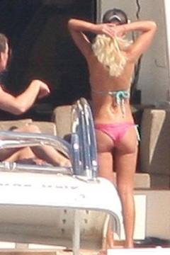 17. Tara Reid – purple bikini, 2009