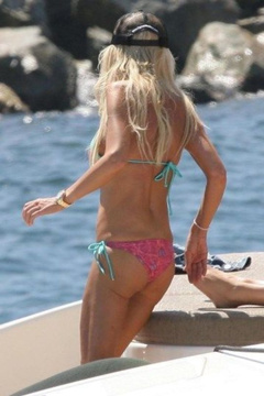 20. Tara Reid – purple bikini, 2009