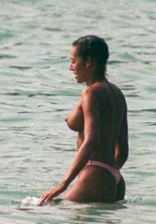 Melanie Brown - Topless swimming.