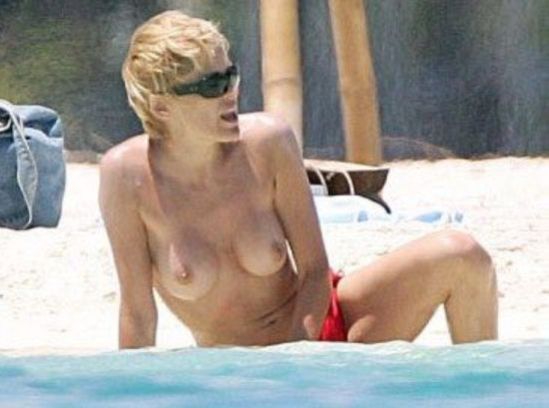 Sharon Stone - topless at the beach, 2005.