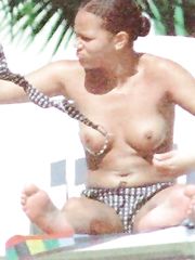 Angela Griffin – Topless sunbathing, 2001