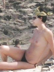 Charlize Theron – Topless sunbathing, 2005
