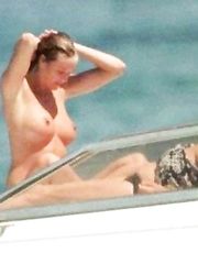 Elle Macpherson – Topless on a boat near St. Tropez, 2006