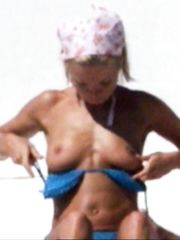 Geri Halliwell – Topless sunbathing, 2001