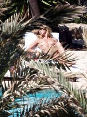 Heidi Klum – Topless sunbathing, 2011