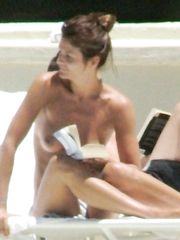 Helena Christensen – Topless sunbathing, 2006