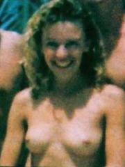 Kylie Minogue – topless at the beach - young