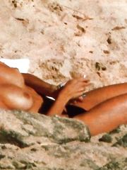 Penelope Cruz – Topless sunbathing, 1999