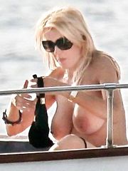 Rita Rusic – topless on a yacht, 2011